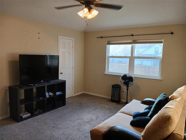 living room featuring ceiling fan and carpet flooring