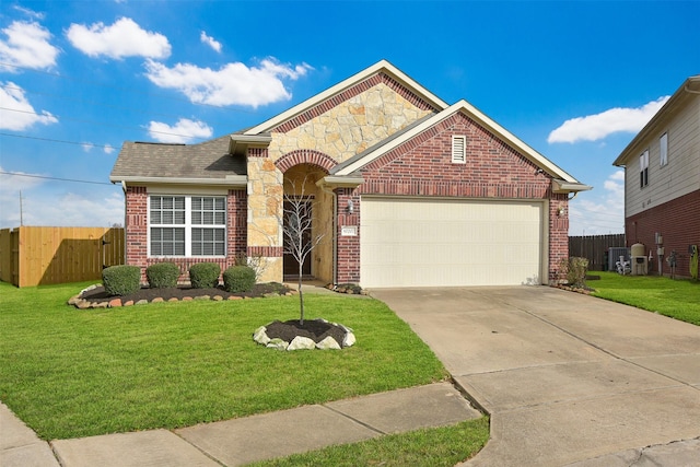 view of front of property with a garage and a front yard