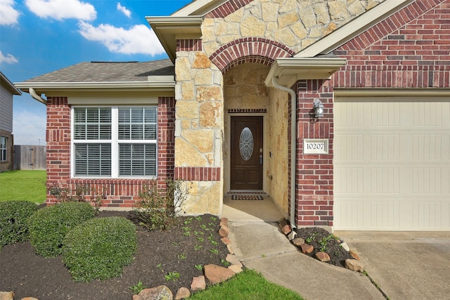 entrance to property featuring a garage