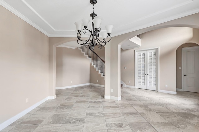 interior space with french doors and ornamental molding