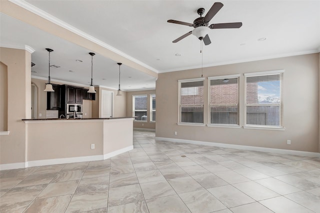 unfurnished living room with ornamental molding and ceiling fan