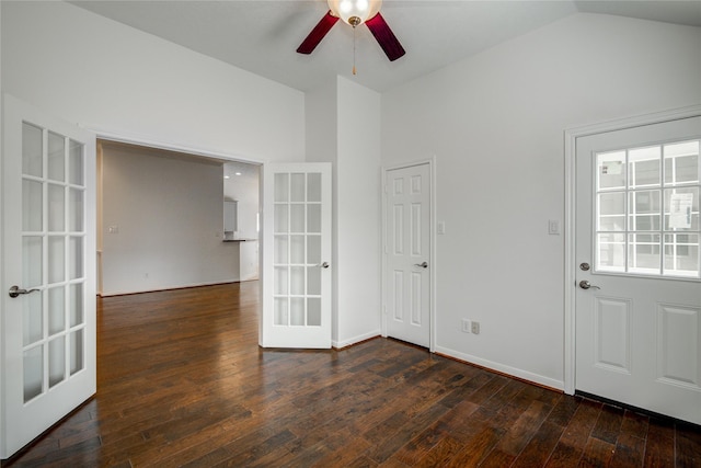 interior space featuring vaulted ceiling, dark hardwood / wood-style floors, ceiling fan, and french doors