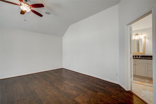 bonus room with ceiling fan, lofted ceiling, sink, and hardwood / wood-style floors