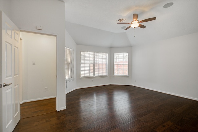 unfurnished room with lofted ceiling, dark wood-type flooring, and ceiling fan