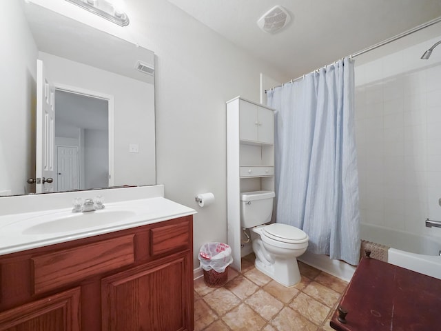 full bathroom with vanity, toilet, and shower / bath combo