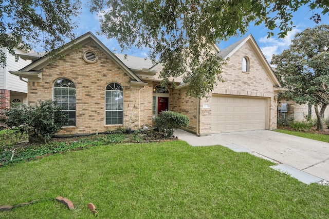 view of front property featuring a garage and a front lawn