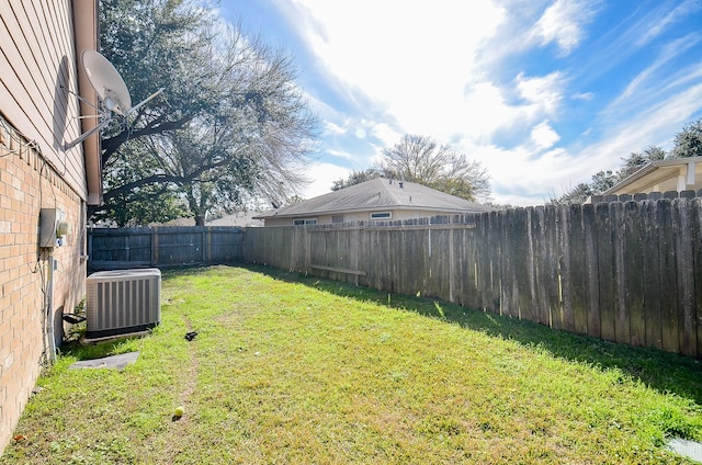 view of yard featuring central AC