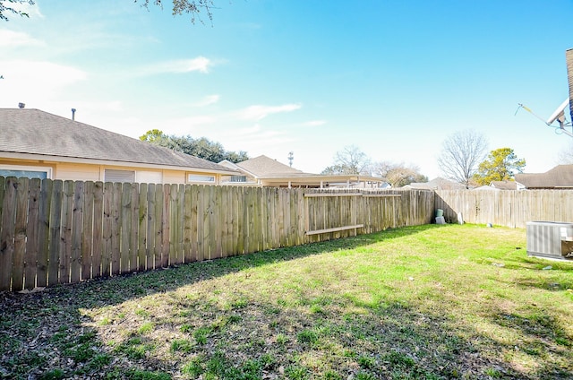 view of yard with central AC unit