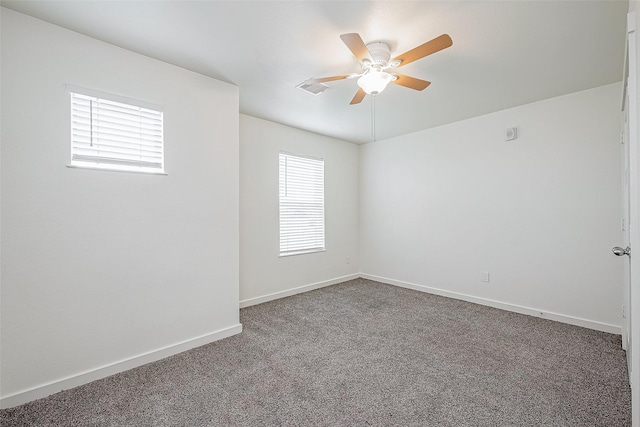 carpeted empty room with ceiling fan