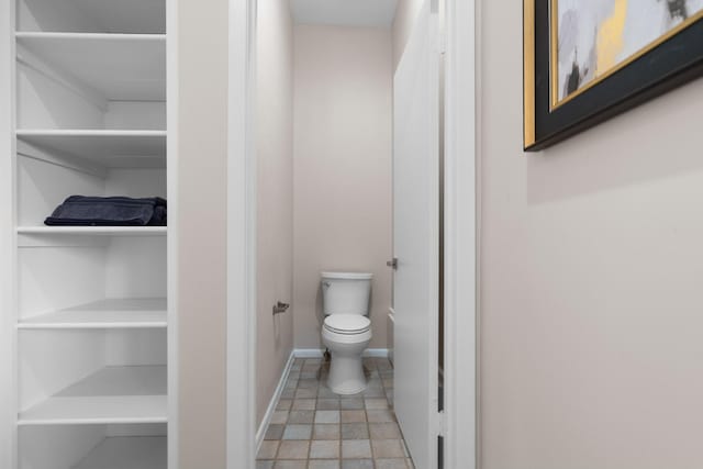 bathroom featuring toilet