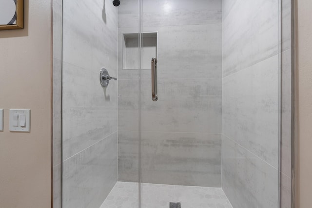 bathroom featuring walk in shower