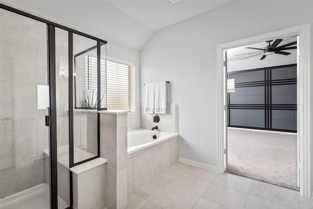 bathroom featuring vaulted ceiling, separate shower and tub, tile patterned floors, and ceiling fan