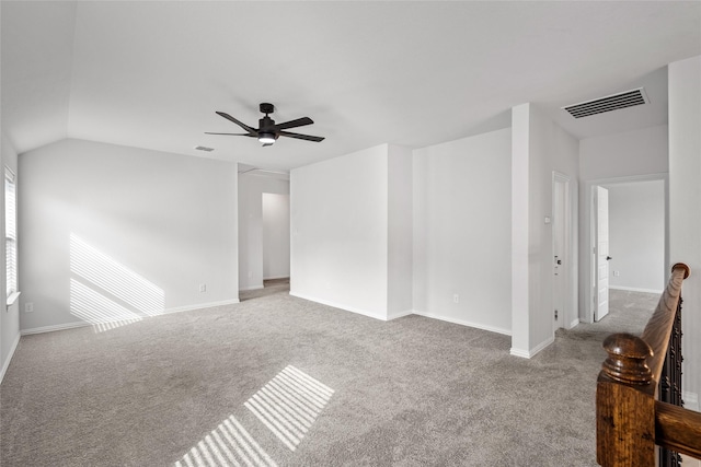 carpeted empty room with ceiling fan