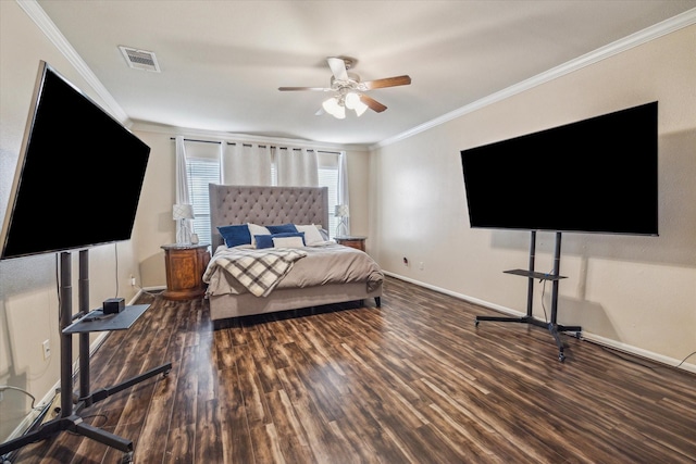 bedroom featuring dark hardwood / wood-style flooring, ornamental molding, and ceiling fan