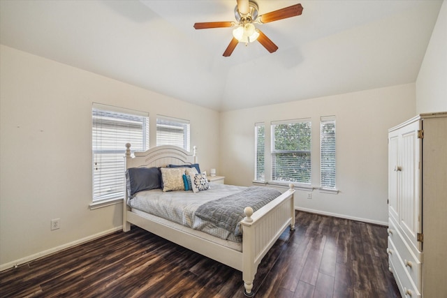 bedroom with multiple windows, vaulted ceiling, dark hardwood / wood-style floors, and ceiling fan