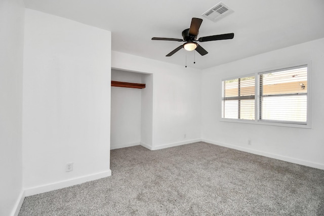 2713 John St, La Marque, TX 77568 - unfurnished bedroom with ceiling fan, carpet, baseboards, visible vents, and a closet