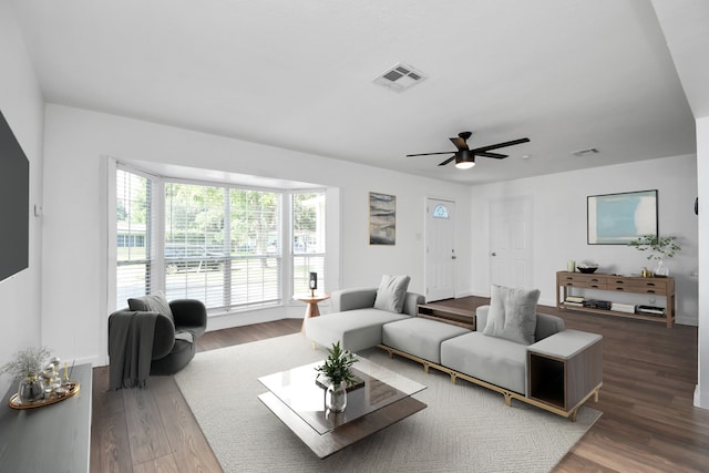 2713 John St, La Marque, TX 77568 - living room with ceiling fan, wood finished floors, and visible vents