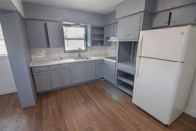 2713 John St, La Marque, TX 77568 - kitchen featuring freestanding refrigerator, open shelves, a sink, and gray cabinets