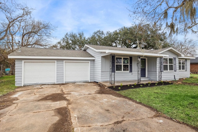 ranch-style home featuring a garage and a front yard