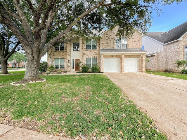 view of front of house with a garage and a front yard