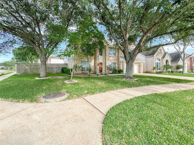 view of front of home with a front yard