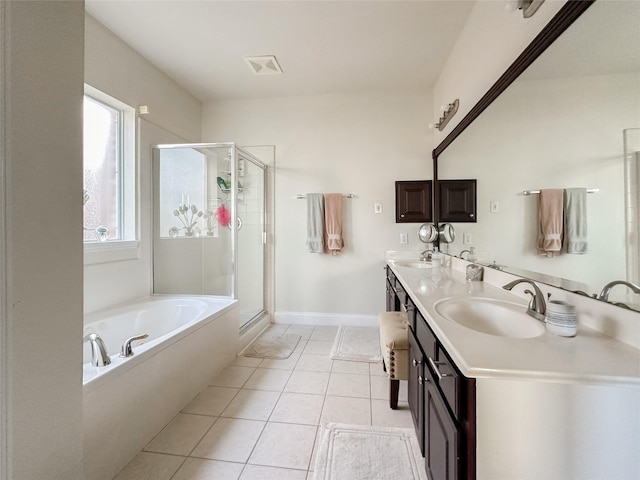 bathroom with vanity, independent shower and bath, and tile patterned flooring