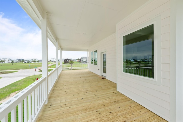 wooden deck featuring covered porch