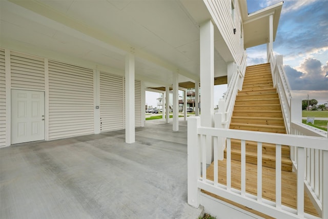 exterior space with a carport