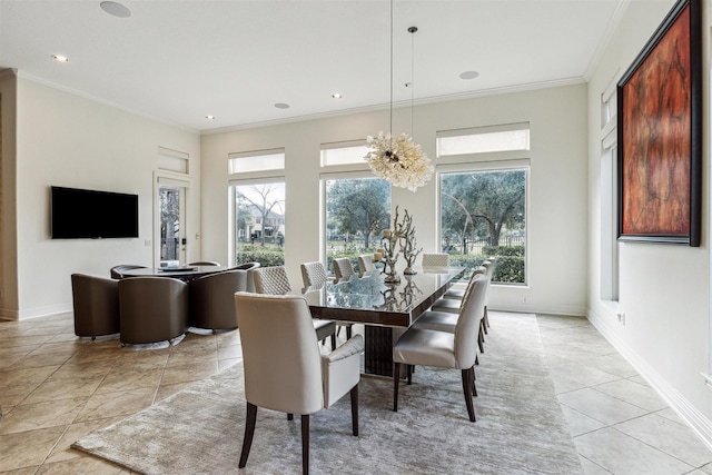 dining room with a notable chandelier, light tile patterned floors, and ornamental molding