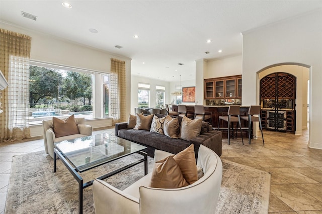 living room with crown molding