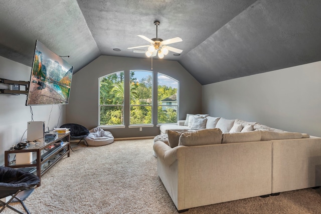 carpeted living room with ceiling fan, lofted ceiling, and a textured ceiling