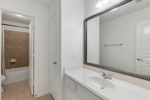 full bathroom featuring vanity, tile patterned flooring, shower / bath combo, and toilet