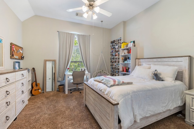 bedroom featuring ceiling fan, lofted ceiling, and dark colored carpet