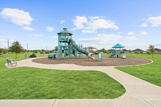 view of play area featuring a lawn