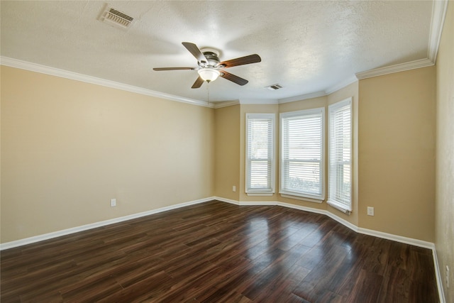 spare room featuring ornamental molding, dark wood-type flooring, ceiling fan, and a textured ceiling