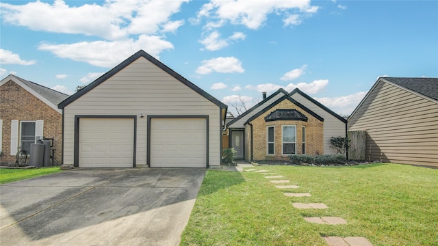 view of front facade featuring a garage and a front yard