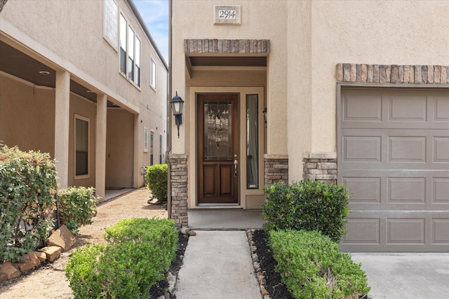 property entrance featuring a garage