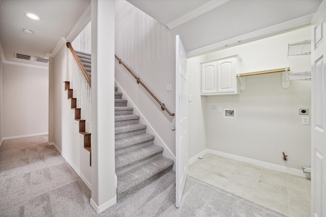 stairway featuring ornamental molding and carpet flooring