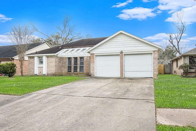 single story home with a garage and a front yard