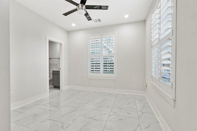 empty room featuring ceiling fan