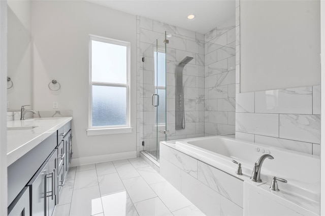 bathroom featuring plus walk in shower and vanity