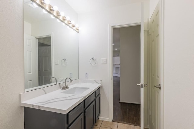 bathroom with vanity and tile patterned floors