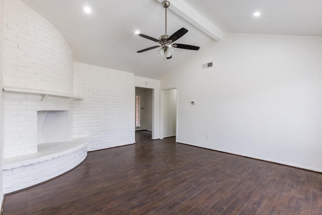 unfurnished living room with dark wood-style flooring, a fireplace, visible vents, a ceiling fan, and beam ceiling