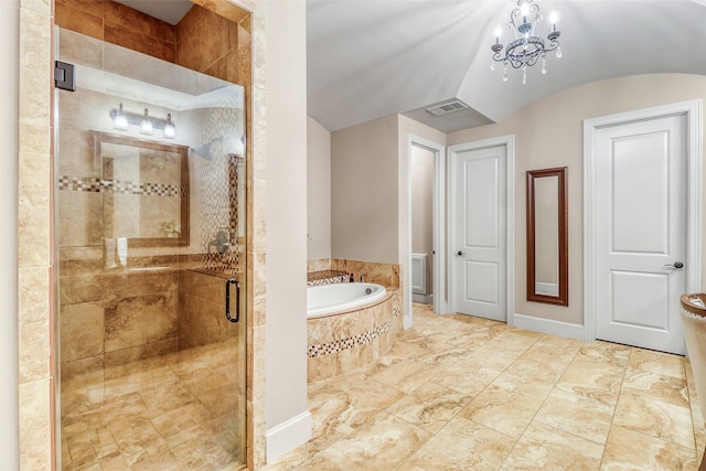 bathroom featuring vaulted ceiling, separate shower and tub, and an inviting chandelier