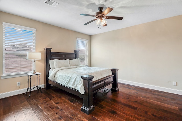 bedroom featuring ceiling fan and dark hardwood / wood-style flooring