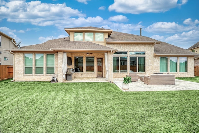 back of house with a patio, an outdoor hangout area, ceiling fan, and a lawn