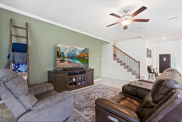 tiled living room featuring crown molding and ceiling fan