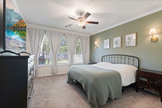 bedroom with ornamental molding, light carpet, and ceiling fan