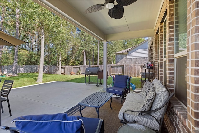 view of patio / terrace with grilling area and ceiling fan