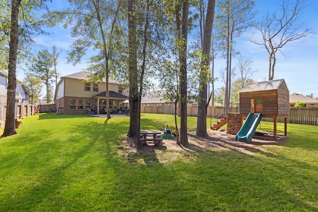 view of yard with a playground